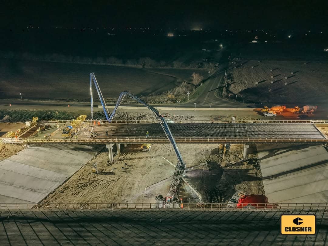 Closner-supported concrete paving crew on a highway jobsite